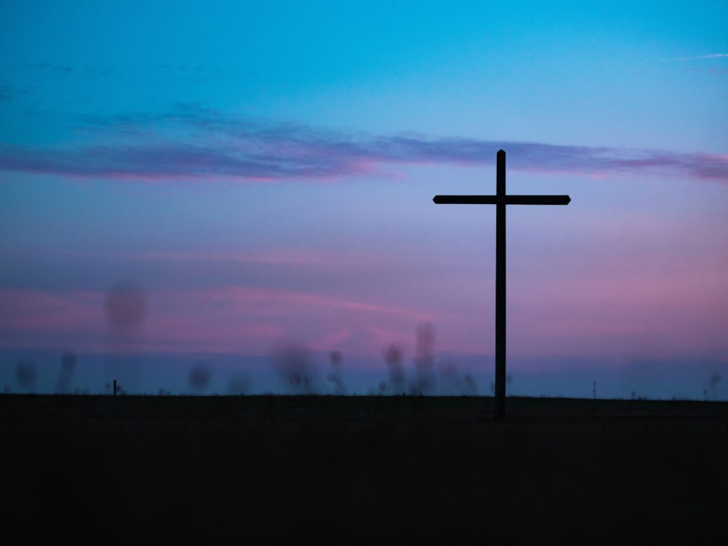 A cross in silhouette at sunrise can help encourage your faith.