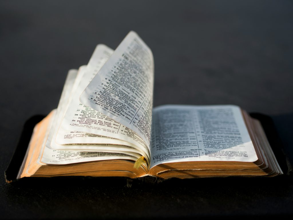 An open Bible reminds us that meditating on Scripture can help us stress less and sleep better.