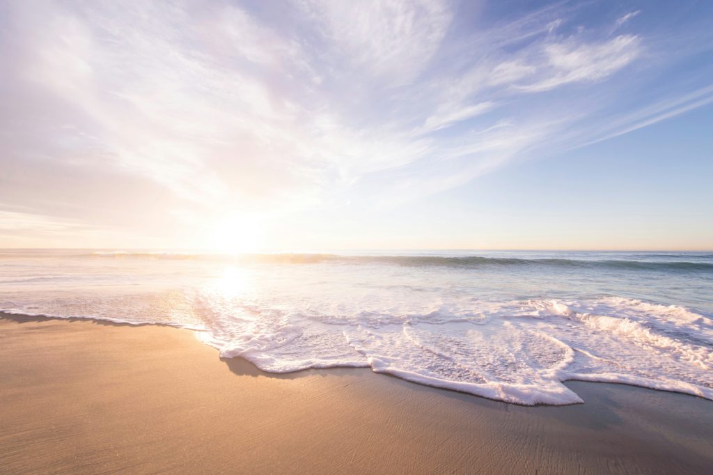 A peaceful beach scene with gentle waves can produce calming sounds that help improve sleep.