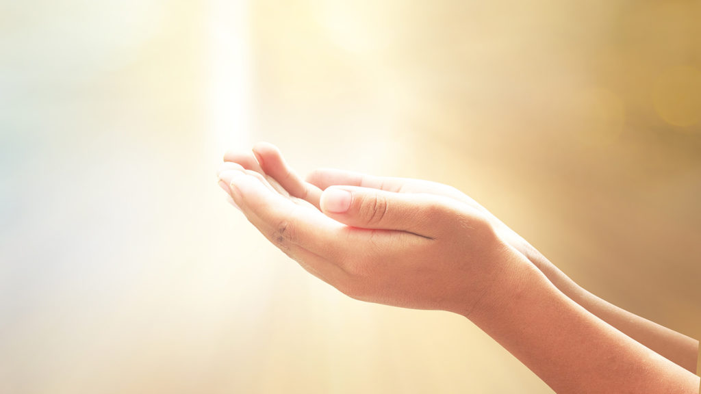 Royalty-Free Stock Photo: Open hands practicing the art of letting go.