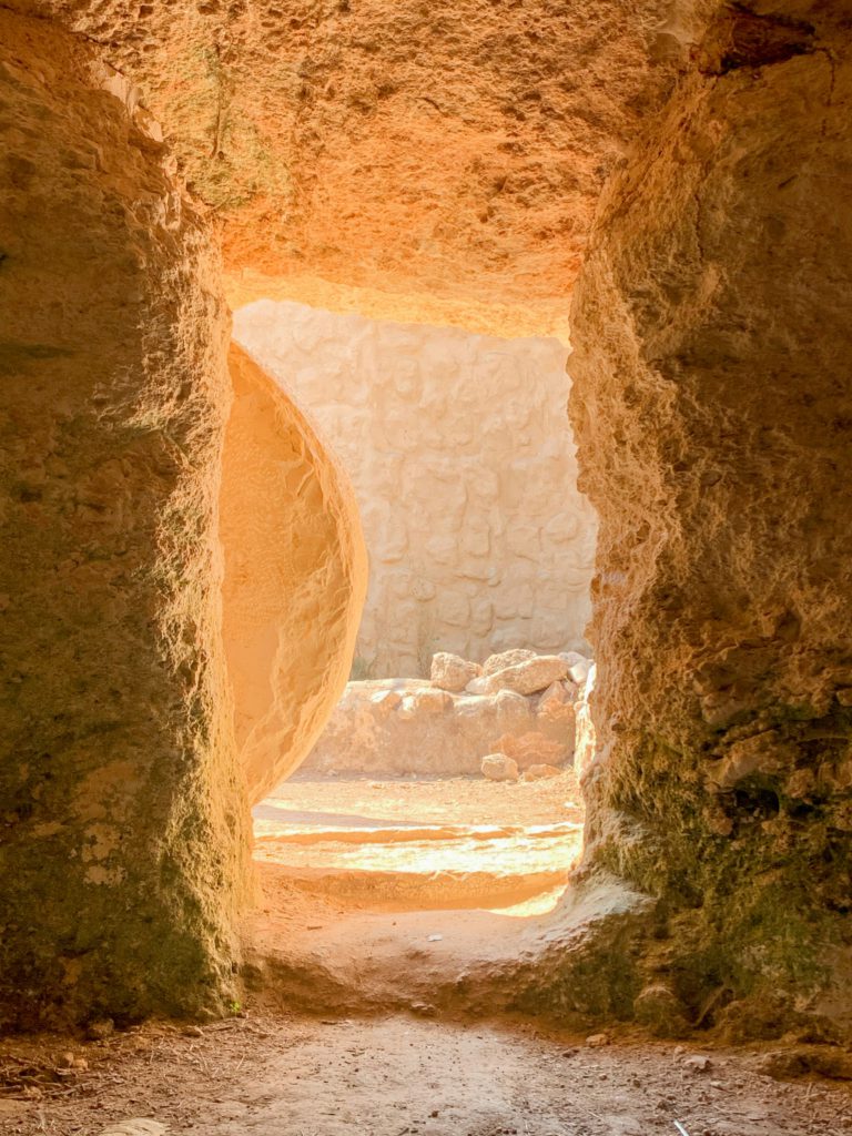 An open doorway of a tomb with a round stone rolled away from the entrance can help you with overcoming skepticism about who Jesus is.