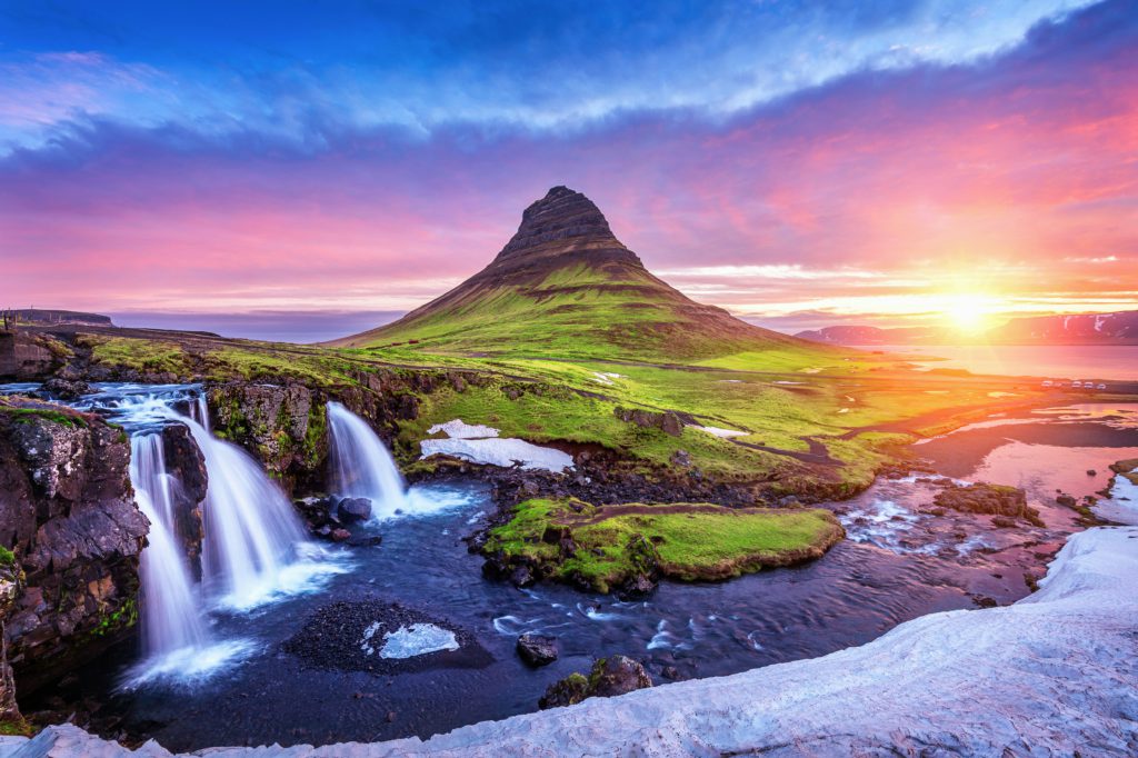 Kirkjufell in Iceland at sunrise exhibits the splendor of the divine.