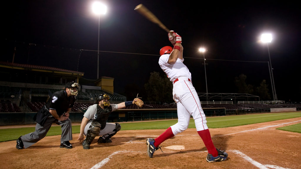 Royalty-free stock image: A baseball player takes a mighty swing on faith; Getty Images