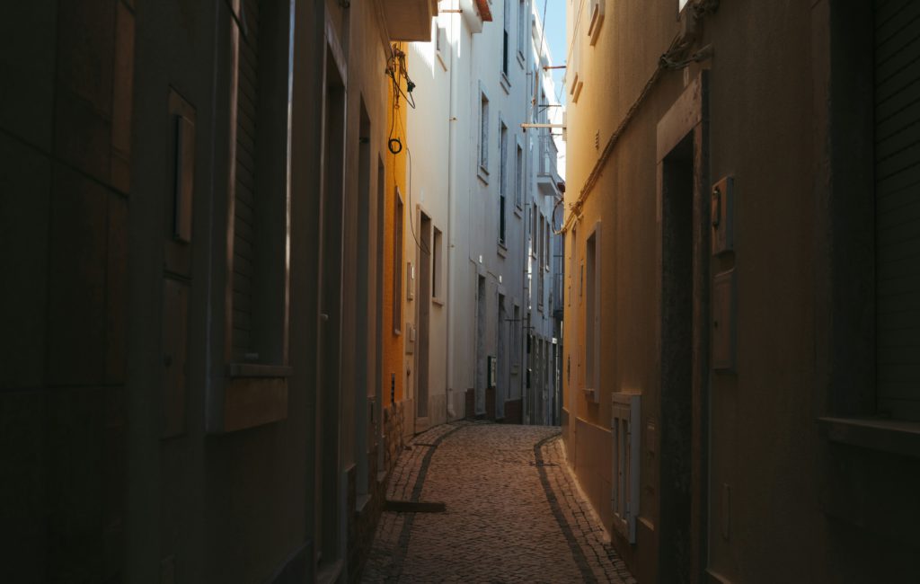A narrow alley between buildings illustrates what dealing with doubt can feel like.