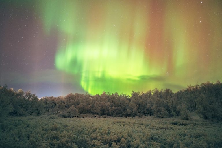 The brilliant aurora borealis displays the transformative power of God.