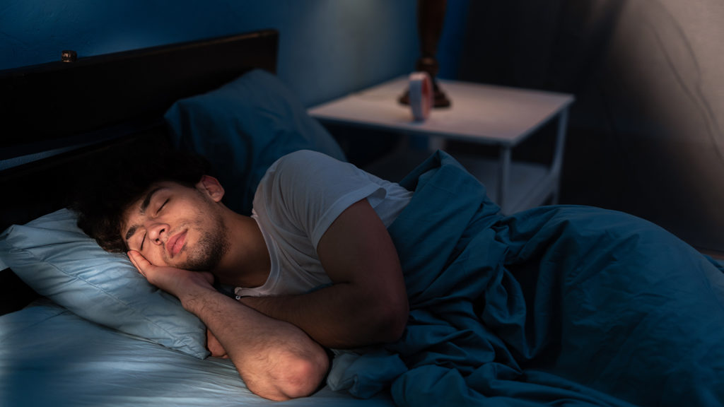 Royalty-Free Stock Photo: Young man sleeping.