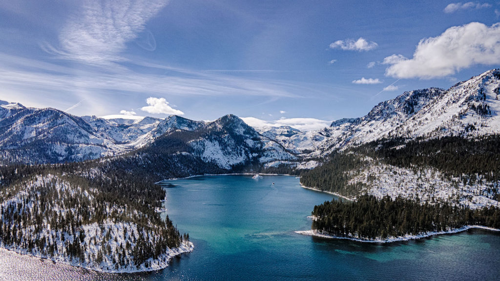 Emerald Bay surrounded by the Sierra Mountains in the winter bear witness to God's majesty.